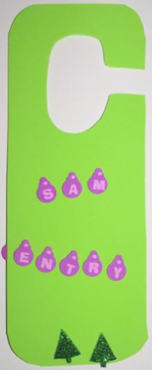 Sam's Christmas door hanger