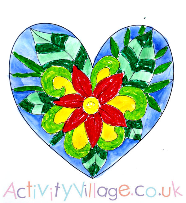 Heart colouring page with watercolour wash over oil pastels