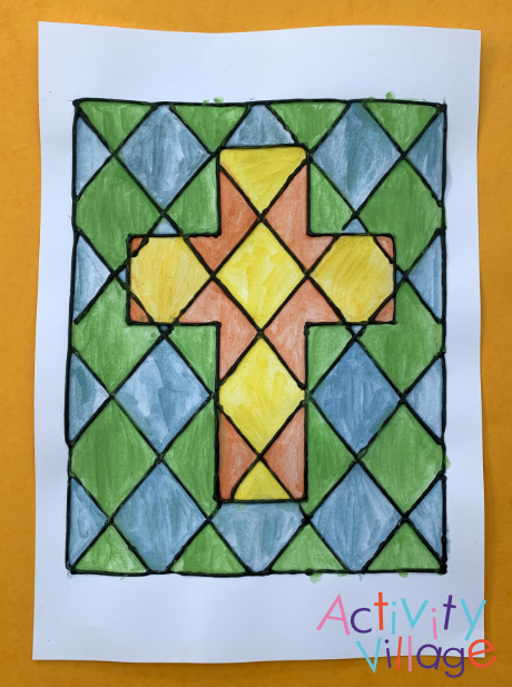 A cool background and warm cross on this picture