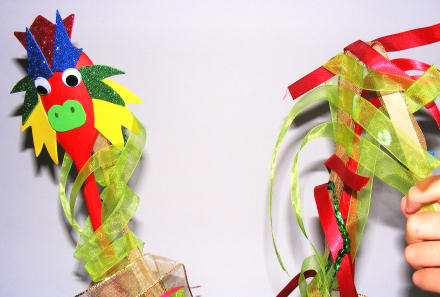 Wooden spoon dragon puppet doing dragon dance